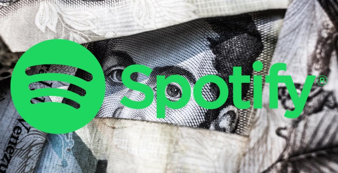 Spotify Logo über einem Geldschein
